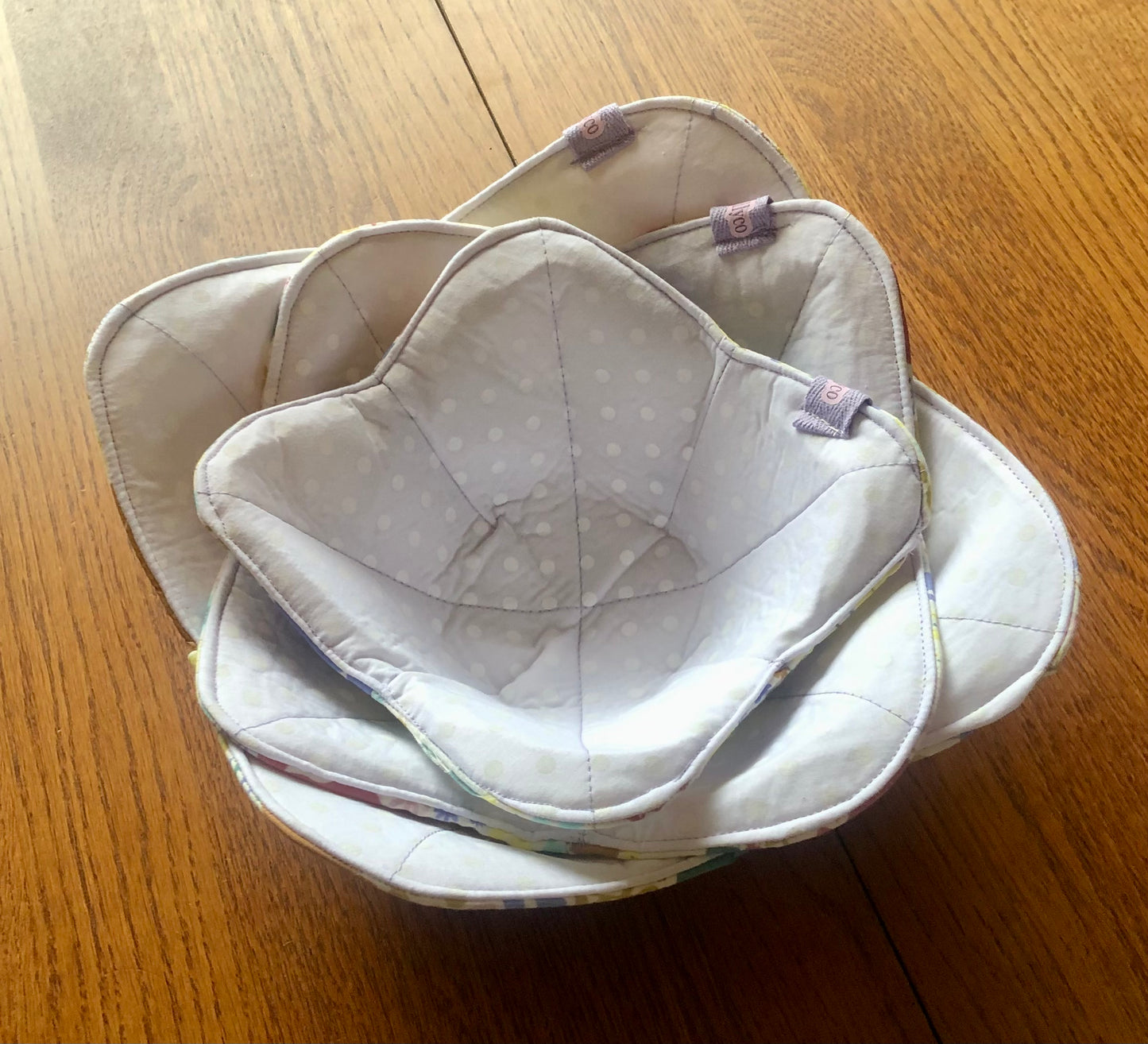 Set Of Three Reversible Bowl Cosies – Spring Bunnies/Polka Dot